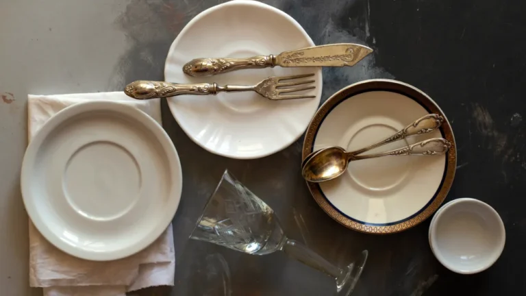 Vintage plates, engraved antique silverware, and an etched glass set the scene for a b1 lesson on personality and design.